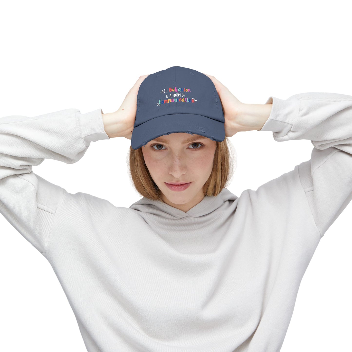 All Behavior is a Form of Communication • Unisex Distressed Hat
