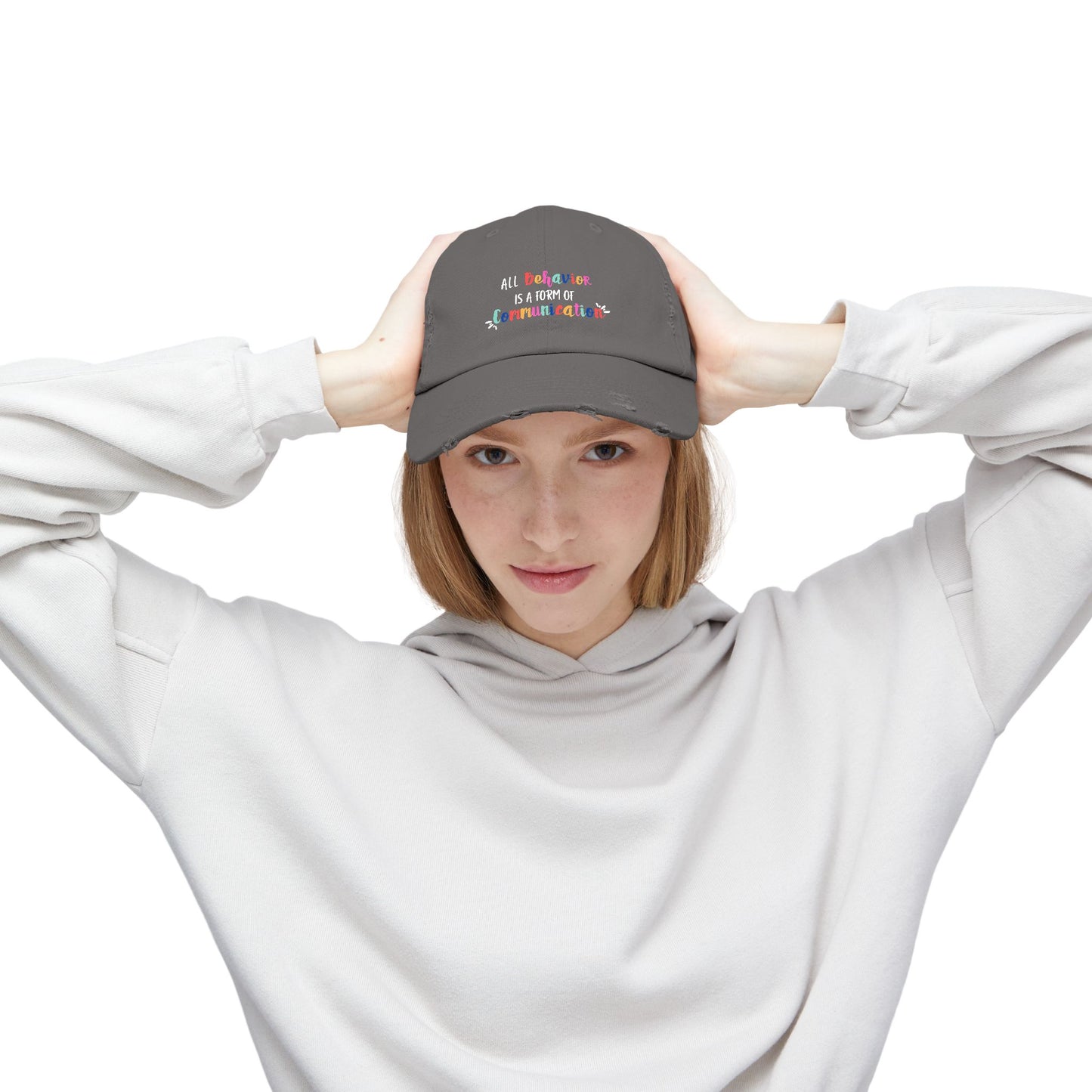 All Behavior is a Form of Communication • Unisex Distressed Hat